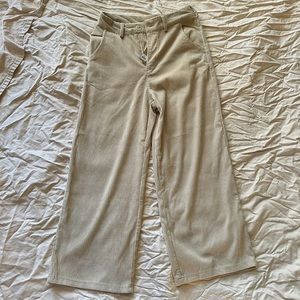 Miss Love size small cream corduroy high waisted, wide legged, ankle fit pants.